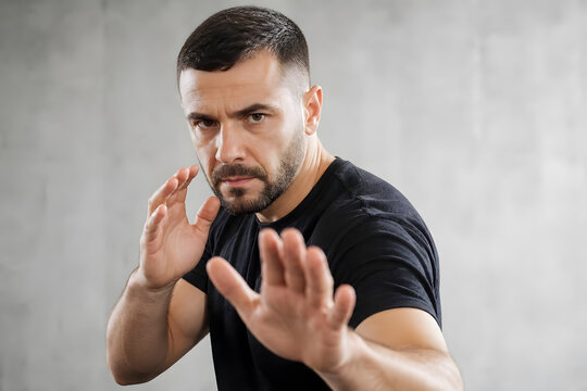 Krav Maga Practitioner in Defensive Stance