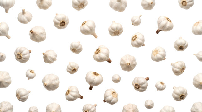 Scattered raw garlic bulbs isolated on transparent background
