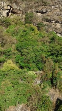 Ascending aerial view of El Nido del Zopilote and Piedrotas Los Compadres in Las Pe&ntilde;as Ecological Park, Zapotl&aacute;n el Grande, Jalisco, Mexico