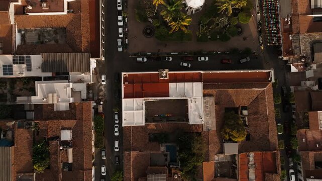 Top down aerial view of Plaza Principal de Comala and San Miguel Arc&aacute;ngel colonial church in Comala, Colima, Mexico