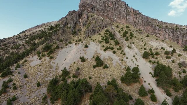 Aerial view revealing the rocky summit of the Nevado de Colima volcano in Mexico