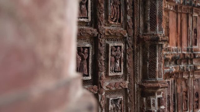 This is a terracotta artwork on the temple wall; it is located at the Krishna Chandraji Temple in Kalna.