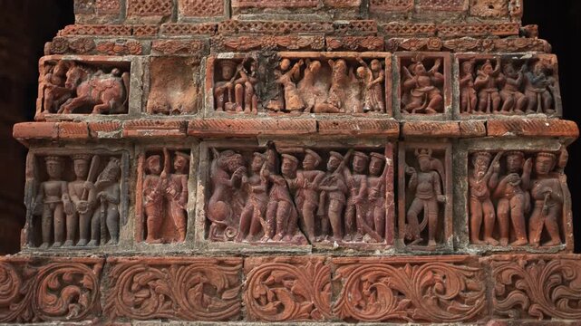 This is a terracotta artwork on the temple wall; it is located at the Krishna Chandraji Temple in Kalna.