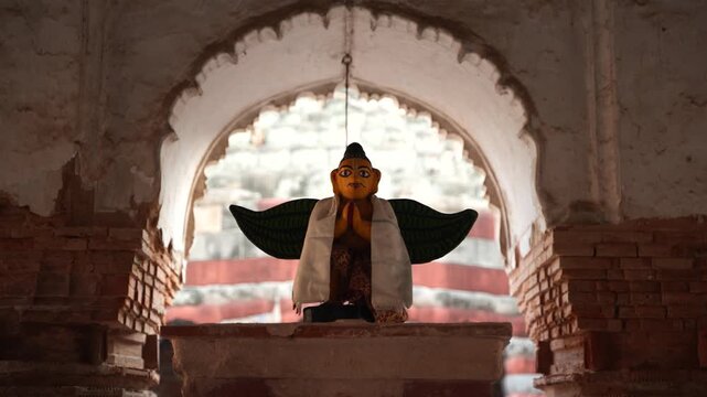 The name of this statuette is 'Guru's Bird'. This bird is mentioned in the Hindu epic, the Ramayana.