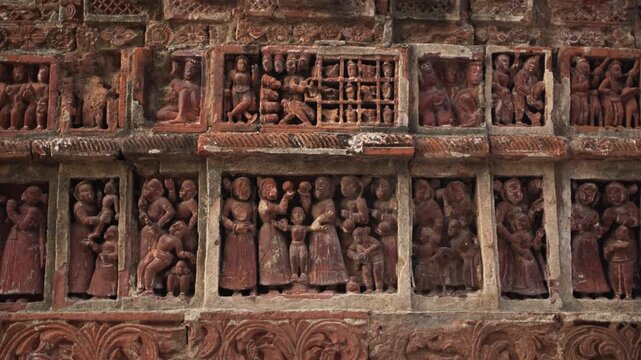 This is a terracotta artwork on the temple wall; it is located at the Krishna Chandraji Temple in Kalna.