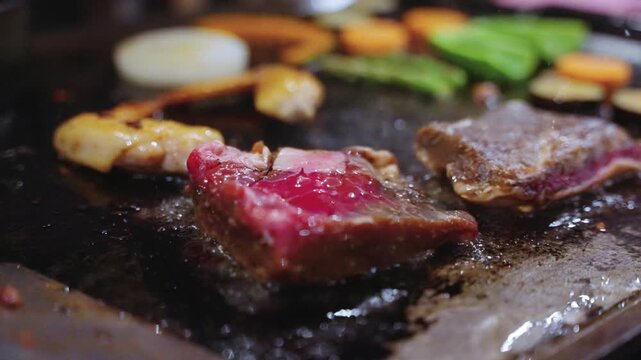 Meat and Veges Sizzle on Barbecue, Close Shot