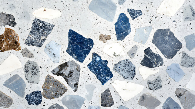 Modern terrazzo flooring with blue and gray stone chips.