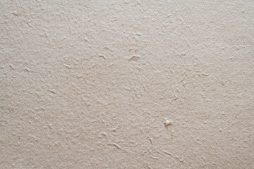 Obraz premium Beige Rough Handmade Paper Texture Background with Natural Fibers
