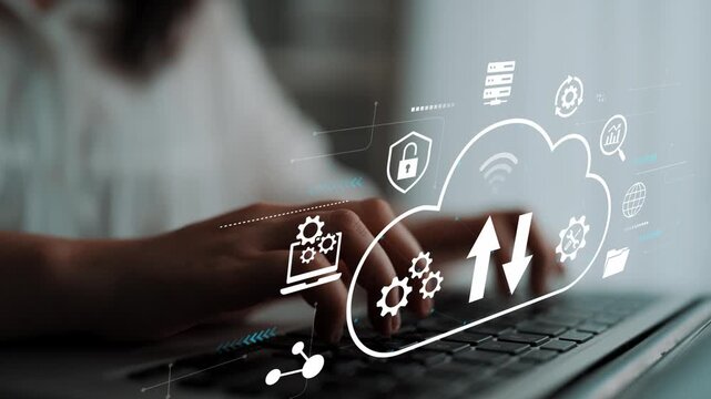 Cloud Computing Concept with Overlayed Icons and Hands Typing on Laptop Keyboard Representing Data Upload and Download Processes. Entropy.