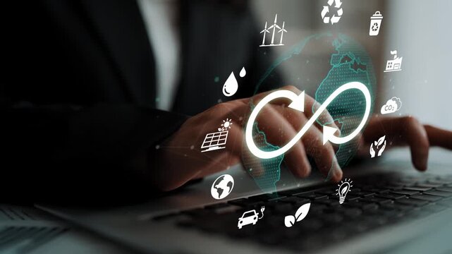 Hands on laptop with symbols of sustainability, recycling, green energy, and technology representing environmental responsibility and innovation for modern business solutions. Entropy.