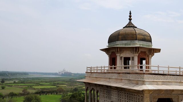 Scenic View of Taj Mahal from Mehtab Bagh with Historic Marble Pavilion in Agra