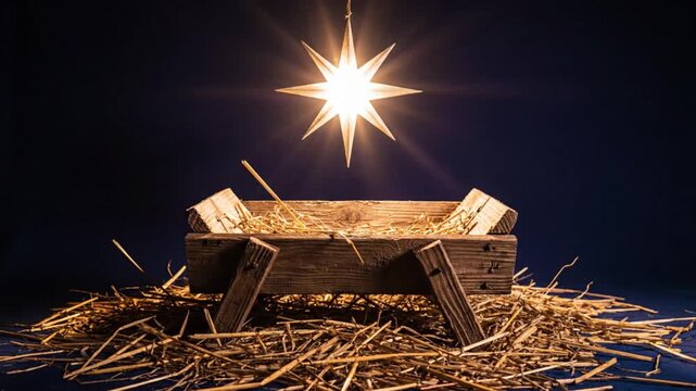 Empty manger scene with bright Christmas star shining down on the straw, a symbol of hope