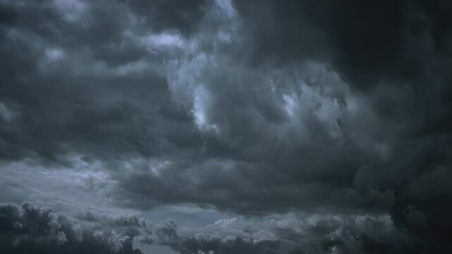 Ominous dark grey storm clouds filling the horizon before rain