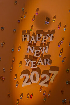 Happy new year 2027 with decorations and bright colors welcoming happiness and joy