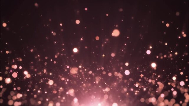 Soft glowing rose gold bokeh particles drift upward against deep charcoal background, shimmering with warm metallic glow and dreamy cinematic atmosphere in elegant slow motion.