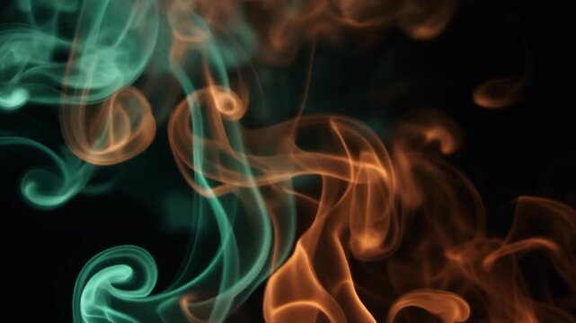 Emerald green and rust orange smoke drifts upward in slow motion, intertwining into elegant wisps under dramatic backlighting with cinematic atmospheric glow against a dark background.