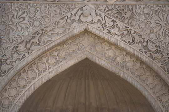Ancient stone carved arch portal in Palace of Shirvanshahs Baku Azerbaijan with copy space