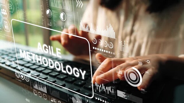 Woman Typing on Keyboard with Overlay of Agile Methodology Graphics and Data Visualization Elements. Asymptotic smart data analytic.