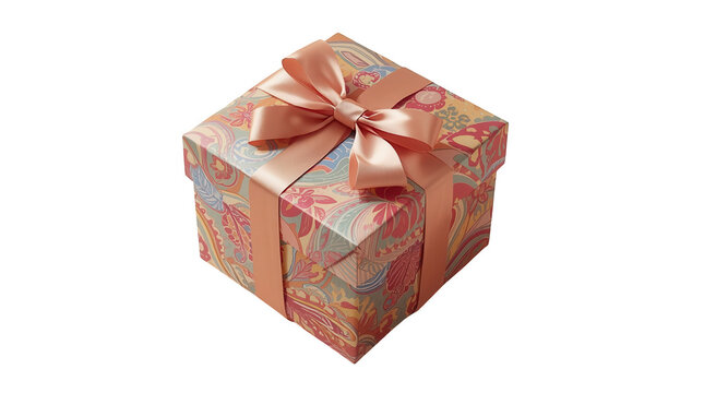 Square gift box wrapped in colorful floral pattern paper topped with satin peach ribbon with decorative paper intricate floral patterns tied