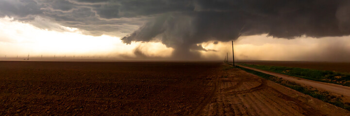 Obraz premium Impacts of Climate Change. El Niño, the environment, rising global temperatures. Pollution and devastating storms featuring tornadoes and strong winds. Uncontrolled weather. Web banner, copy space.