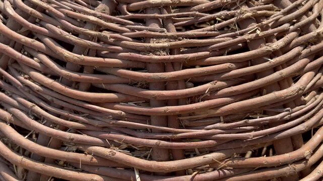 Close-up of traditional handwoven wicker basket texture and pattern