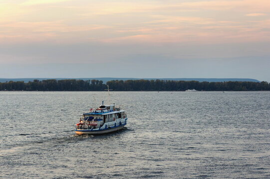 Russia, Samara. August 22, 2025: A river cruise ship carrying passengers sails along the Volga.