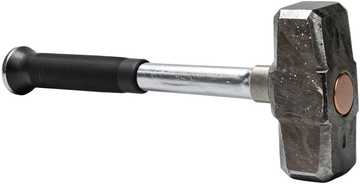 Heavy sledgehammer with steel head and concrete rubble