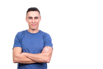 Obraz premium Man standing with arms crossed and proud expression