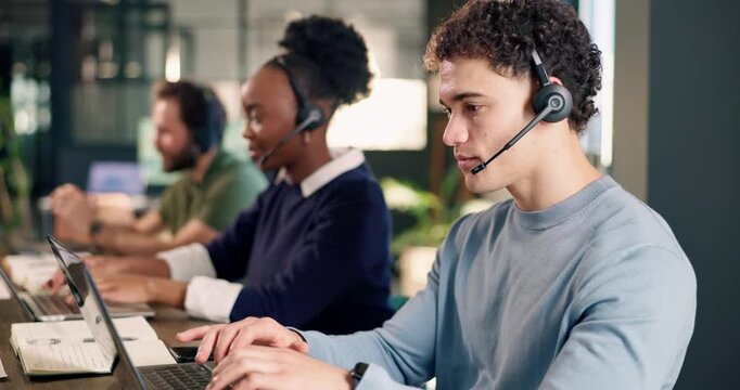 Call center, man and laptop with coworking in office, contact us and communication with help desk. Person, colleagues and typing at pc for online advice, customer support and telecom in workplace