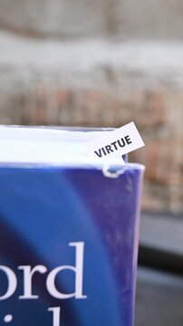 Virtue Word on White Paper Representing Integrity Character and Ethics