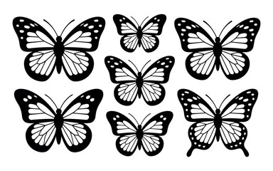 Obraz premium Elegant black butterfly silhouettes with intricate wing patterns in high contrast floating on a bright white backdrop.