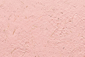 Fototapeta premium Close up macro view of light pink painted wood fiber board texture background with background material compressed particle construction industrial composite close-up