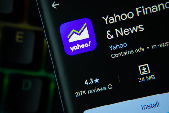 New York, United States - 24 July 2026: Yahoo Finance app page on Google Play Store is seen on a smartphone screen.