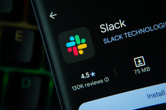 San Francisco, United States - 24 July 2026: Slack app page on Google Play Store is seen on a smartphone screen.