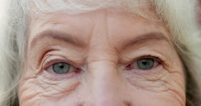Health, eyes and face of senior woman with optometry, optical and glaucoma test for wellness. Serious, portrait and elderly person in retirement with weak eyesight, prescription or cataract removal.