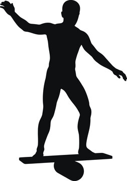 Silhouette of a man balancing on a balance board, performing a trick, athletic move, fitness activity.