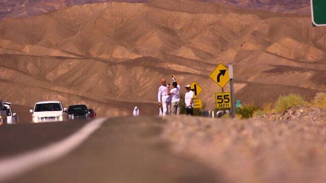 Badwater marathon athlete getting a water spray down in the desert