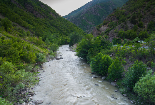 Murky streams flowing with mud from the mountains and wilderness.