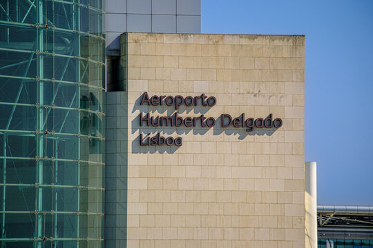 Humberto Delgado Airport sign on building wall, Lisbon, Portugal on