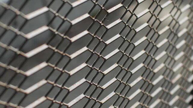 Rusty Chain Link Fence Mesh in Diagonal Perspective with Sunlight