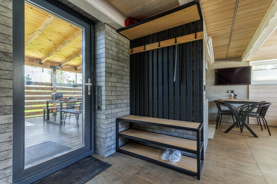 Modern Entrance Hallway Interior with Glass Door to Terrace