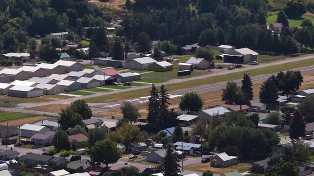 Aerial of airplane hangars in airport community in Cashmere Washington