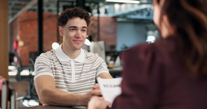Resume, meeting and businessman at job interview in office for recruitment with career opportunity. Discussion, happy and candidate with hiring manager for onboarding process with portfolio or cv.