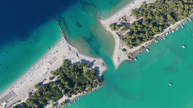 Lagoon Beach Sandbar Framed by Turquoise Waters in Greece