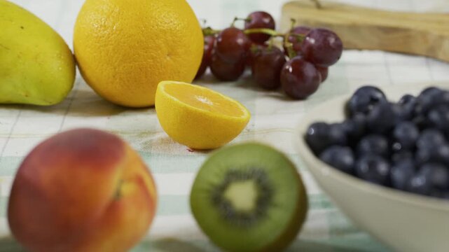 Fruit scattered on kitchen counter - medium shot