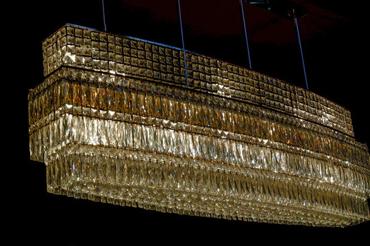 Luxury Crystals chanderliers hung under the white celing,royal lamp in the living room,Antique Ceiling light,mock up interior in classic style,space for text.