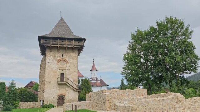 Historic Humor Monastery with unique exterior frescoes, an iconic UNESCO World Heritage site surrounded by nature in Bucovina, Romania.