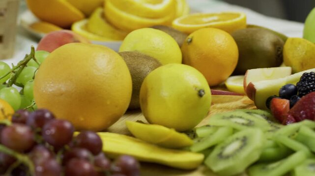 Tracking shot moving over fresh, delicious fruit on kitchen counter