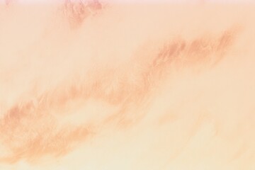 Fototapeta premium Soft abstract color field of peach and cream with heavy applied analog film grain