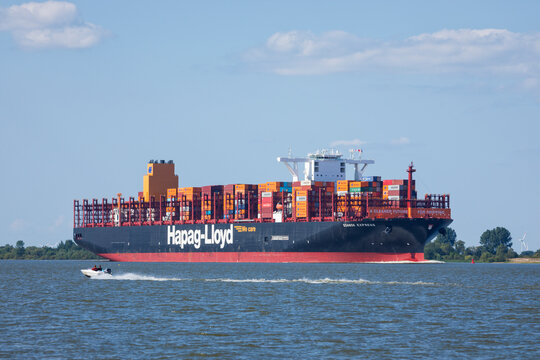 Stade, Germany &ndash; July 14, 2026: Container ship GDANSK EXPRESS, operated by German shipping company Hapag-Lloyd, sailing towards Hamburg on Elbe river.
